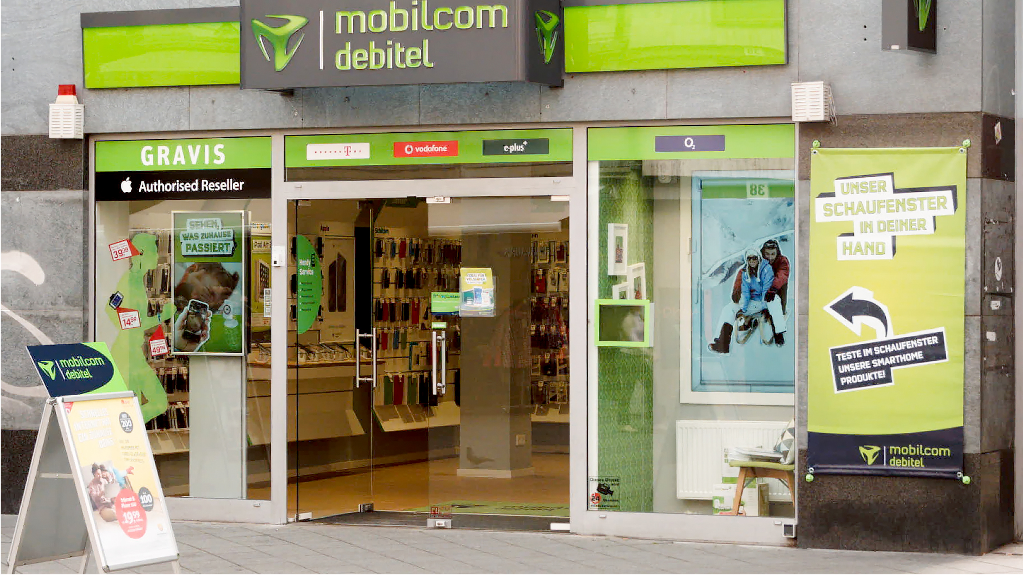 The entrance of the mobile phone store with digital signs